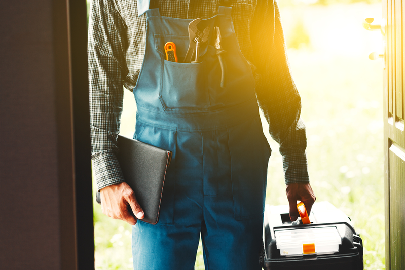 man holding toolbox 