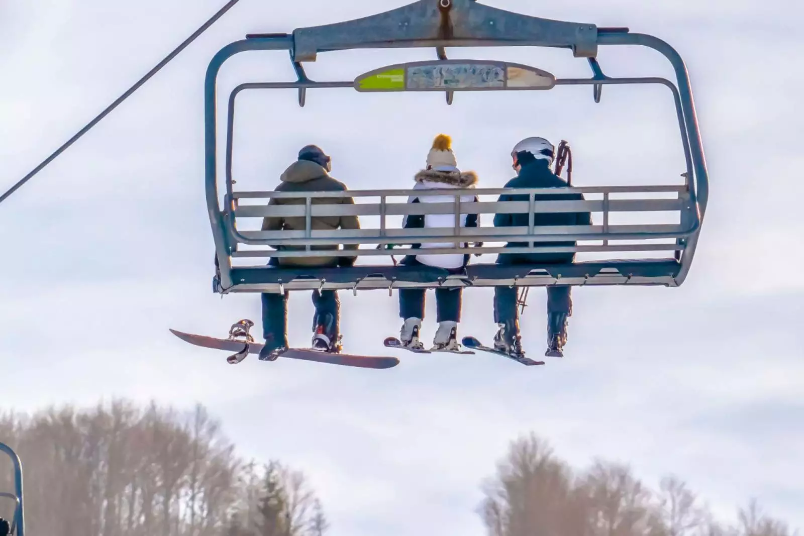 people on ski lift