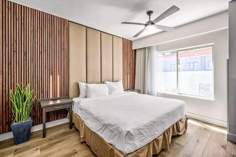 Primary Suite in Golden Aspen with custom king bed, linens, and ensuite spa bath. Designer Condo at Westgate Park City, Ski-In / Ski-Out Resort