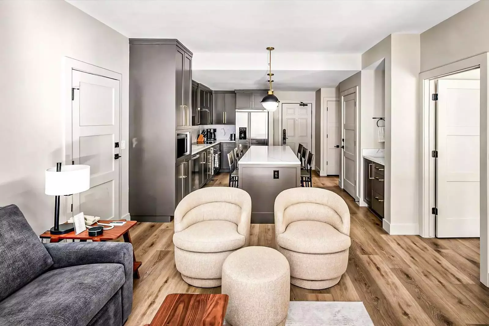 Open-concept floor plan with living, dining, and kitchen. Westgate Park City is perfect for your next Park City vacation offering ski-in/ski-out