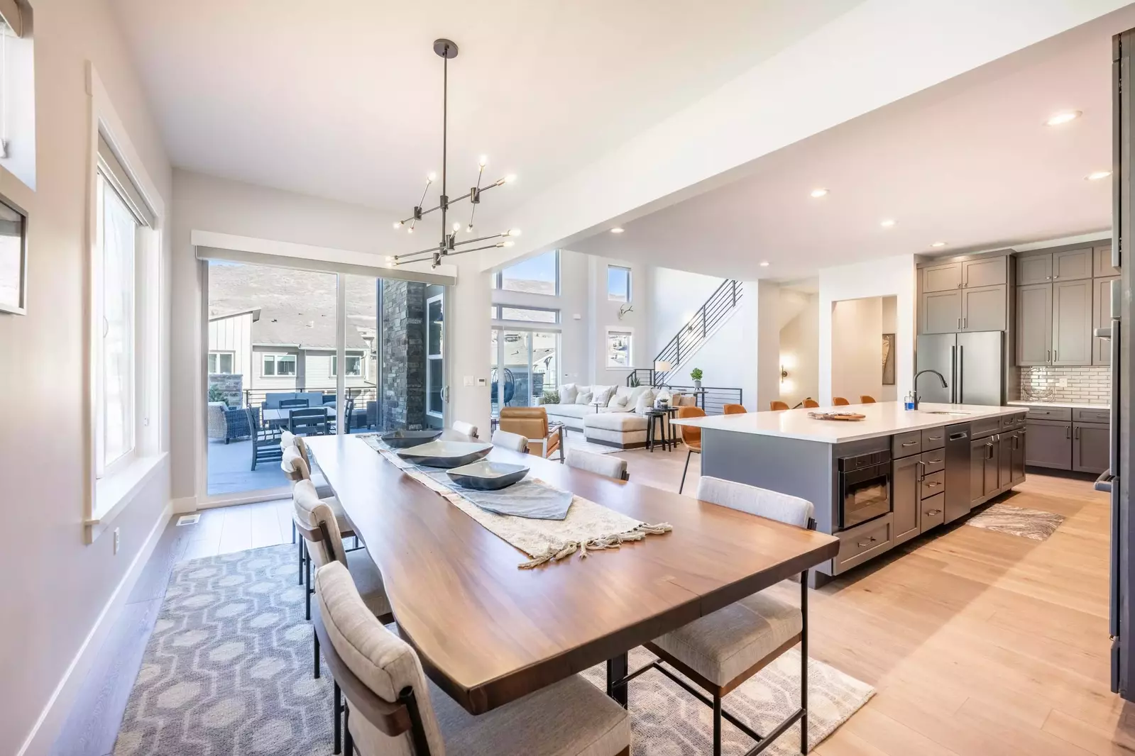 The gorgeous dining room flows right off the kitchen and private balcony. The large kitchen table offers seating for 8 guests.