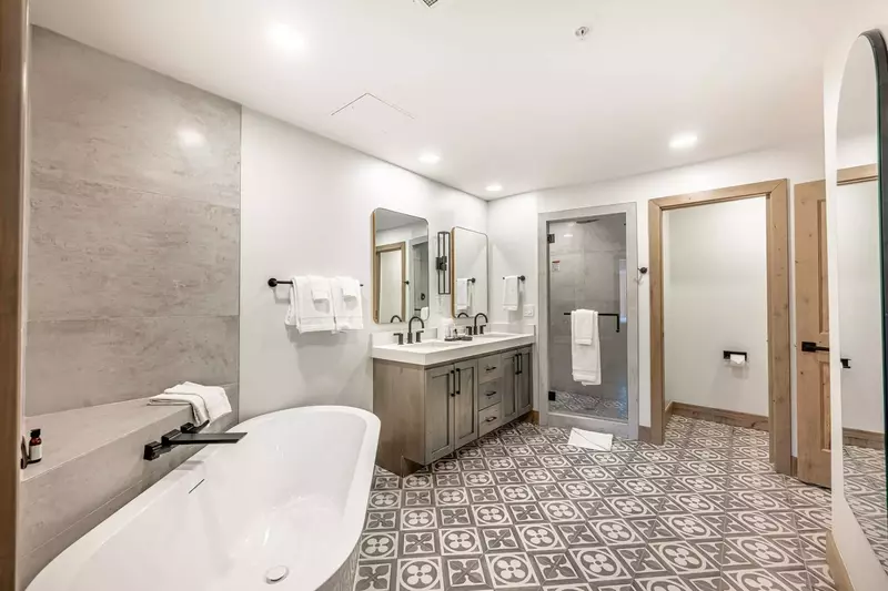 Luxe bath: oversized soaking tub, moroccan tiled floors, walk in steam shower,| Park City Luxe Condo, Park City Airbnb, Westgate Park City, Park City