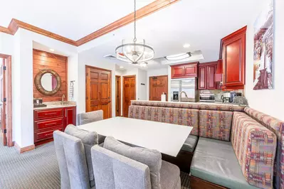 The updated charming dining area is where comfort and style meet.