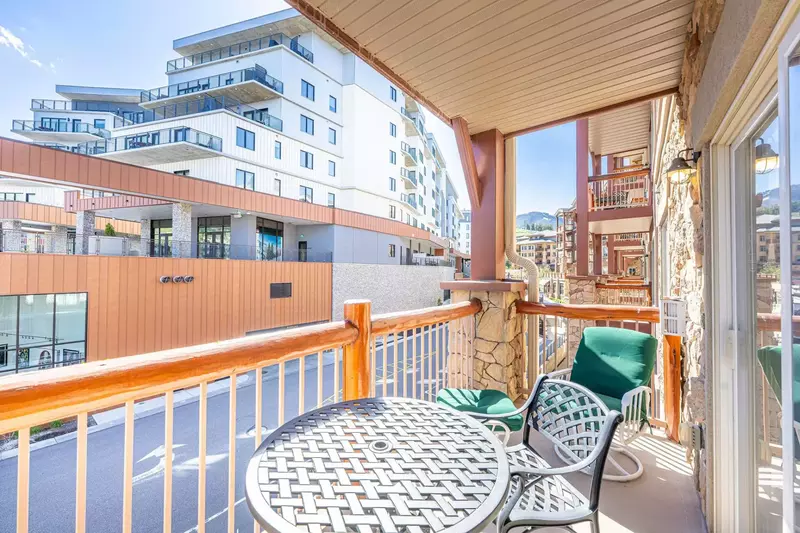 Our home has a private patio offering mountain and resort views of the new Pendry at Park City.