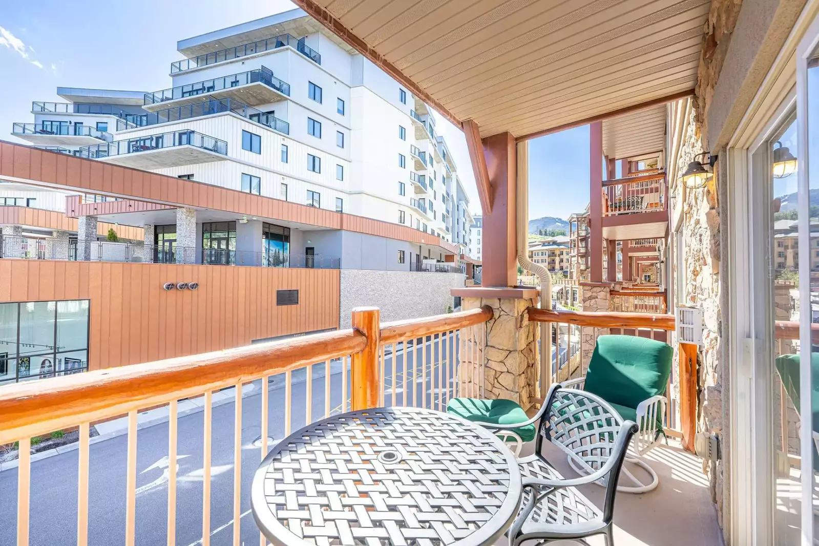 Our home has a private patio offering mountain and resort views of the new Pendry at Park City.