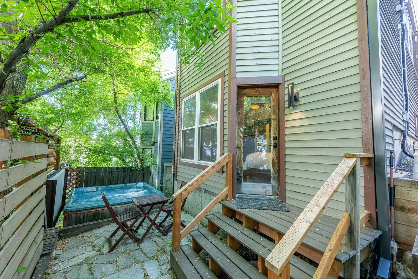 Private hot tub located in the private back yard.