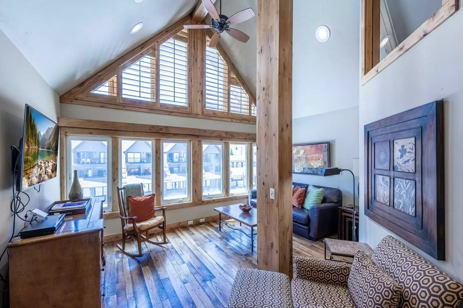 The open floor plan features vaulted ceilings to give an open feel and gives the home a bright airy light.