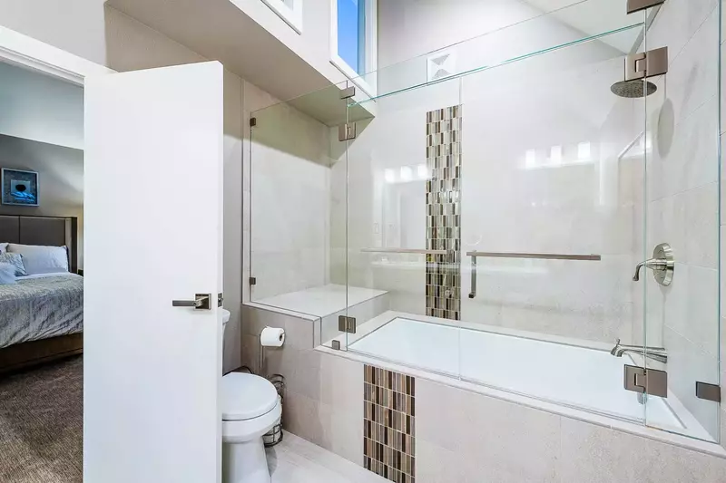 Elegant Master Bathroom - Dual Vanities, Oversized Glass Shower and Tub, Vaulted Ceilings