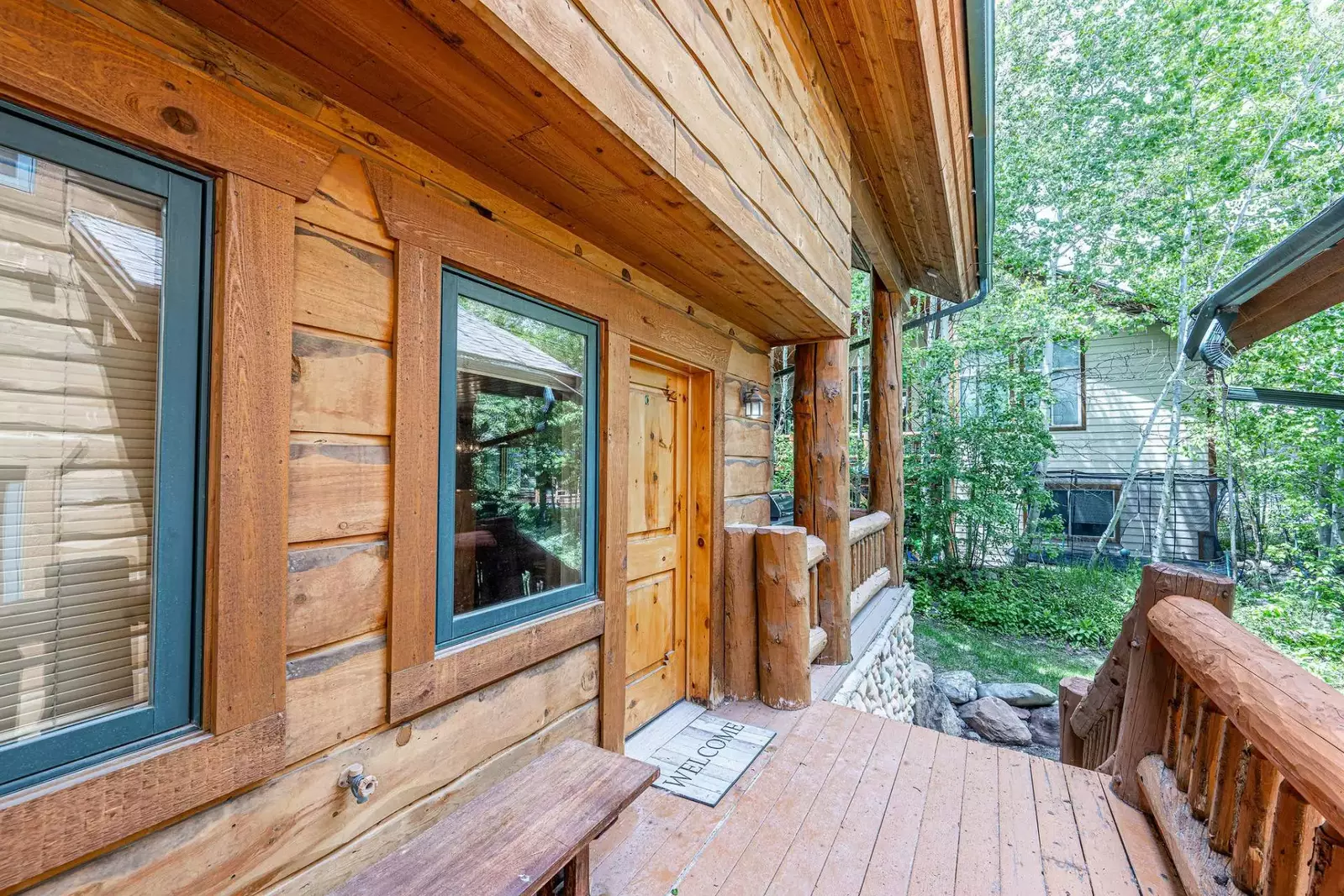 The welcoming entrance to the home has an electronic lock providing keyless entry to the home