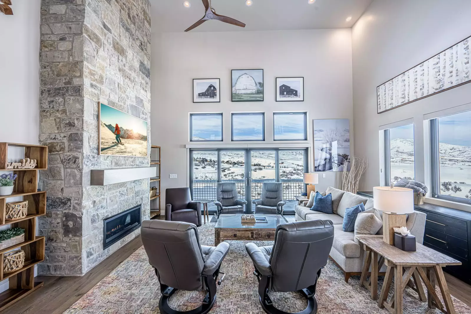 Featuring a large natural rock fireplace, 65" Samsung The Frame Smart TV and comfortable furnishings. It's the perfect place to gather and enjoy a mov
