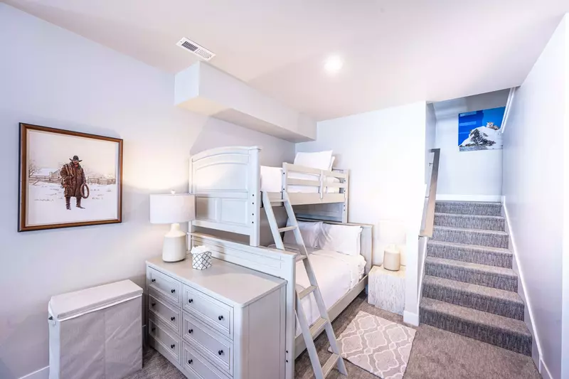 A King sized plus Twin sized Bunk bed located in the Basement