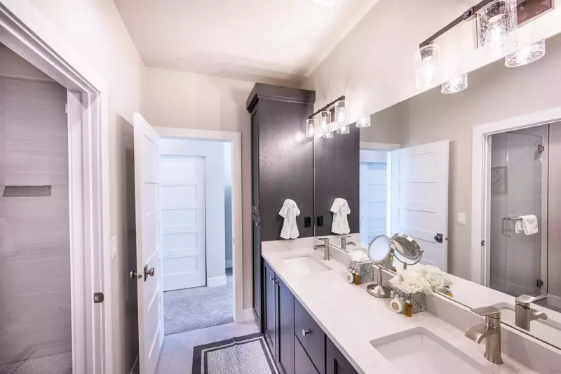 Dual vanity with lots of storage in the guest bathroom