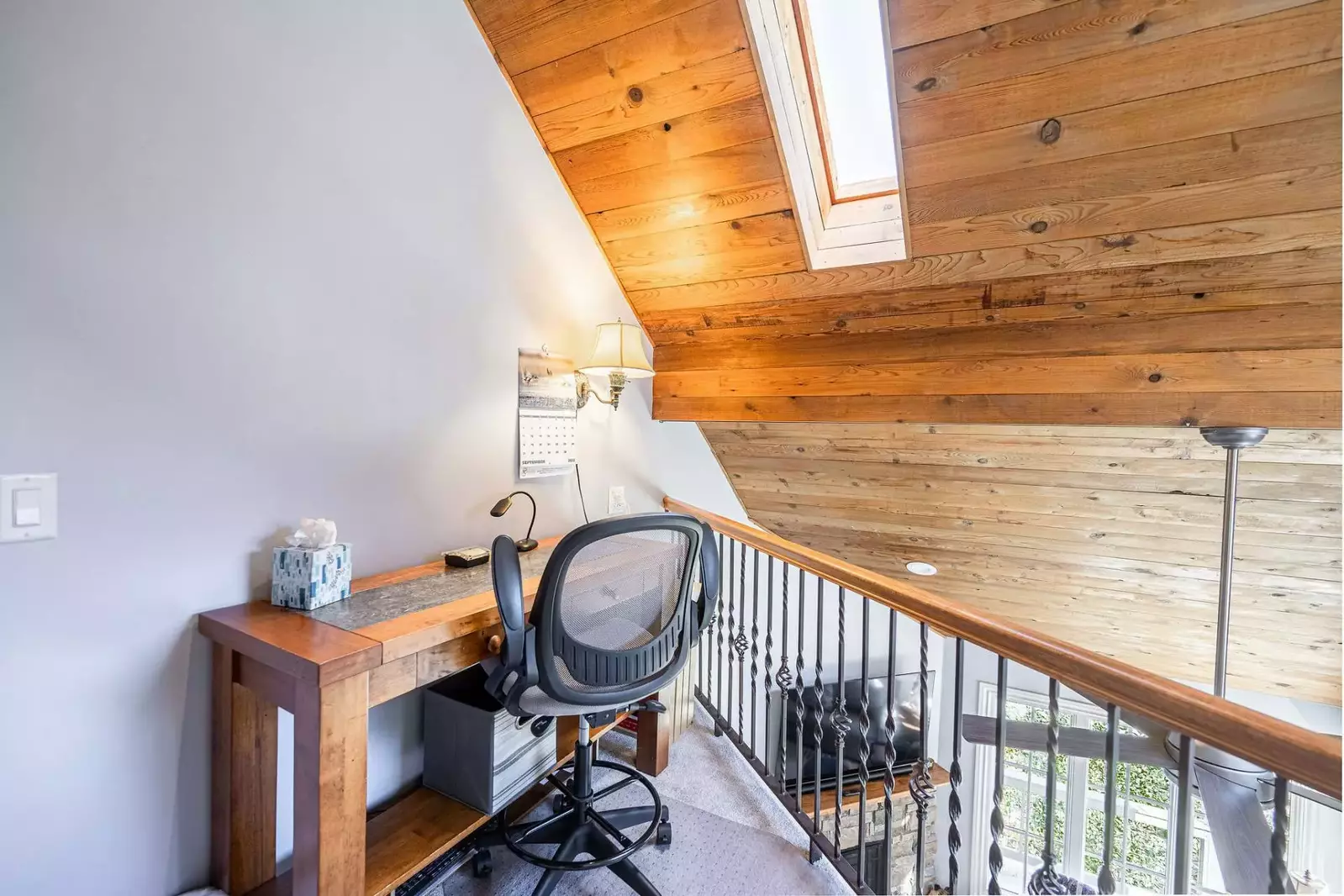 This is another office area located in a small loft area above the living room perfect for anyone to work from home