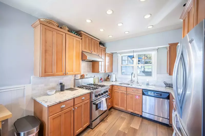 Enjoy the upgraded appliances including a full sized upgrade fridge/freezer, gas stove, and full sized dishwasher.