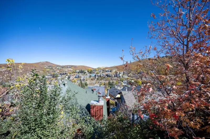 Views from the main floor deck. This home has the perfect location where you can walk to skiing without any stairs.