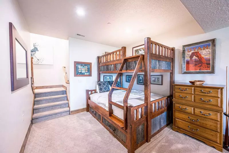 Bunk bed with a trundle bed underneath located in the Game Room