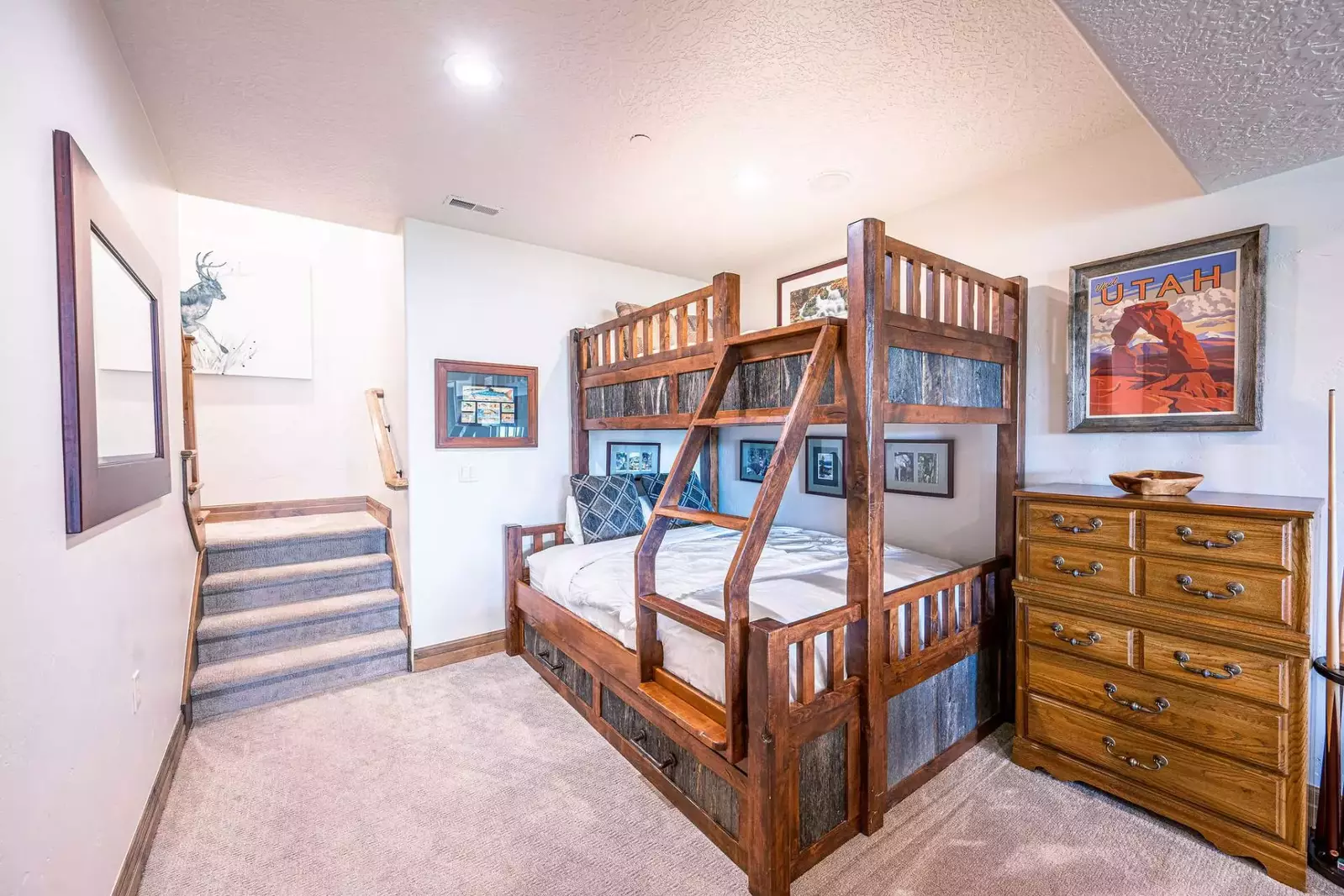 Bunk bed with a trundle bed underneath located in the Game Room