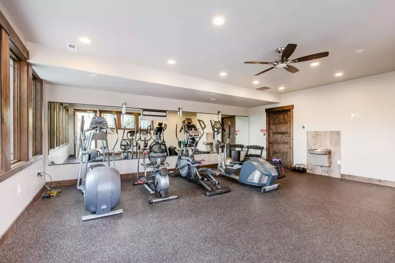 The fitness center for the Blackstone neighborhood is just steps from the home