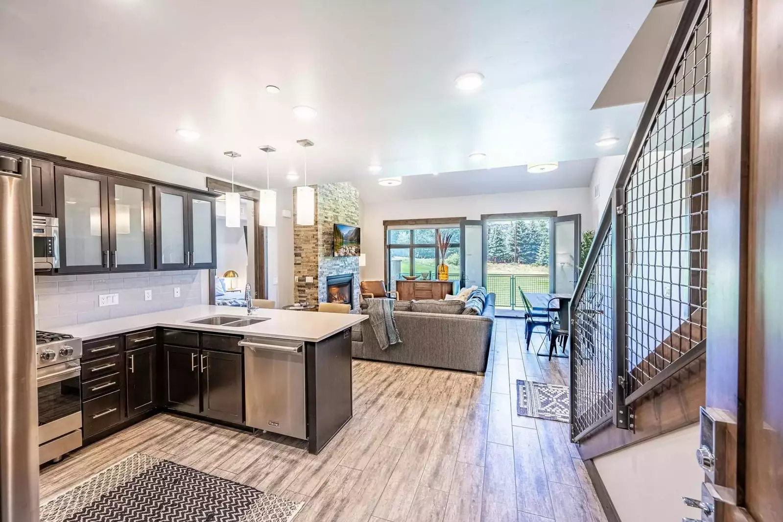 Tastefully designed and professionally designed the home features timeless hardwood flooring, stone gas fireplaces and obvious attention to detail thr