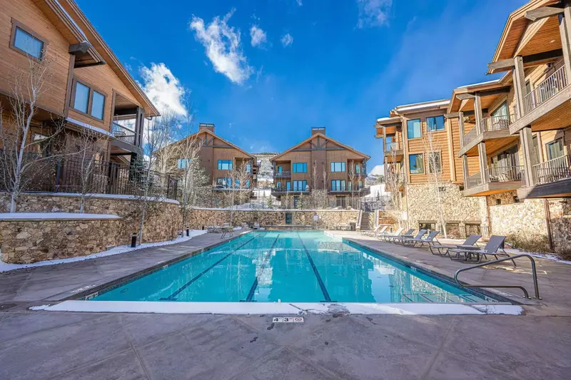 Right in the heart of the neighborhood and just steps from your home, this large communal pool is heated and open in the winter!