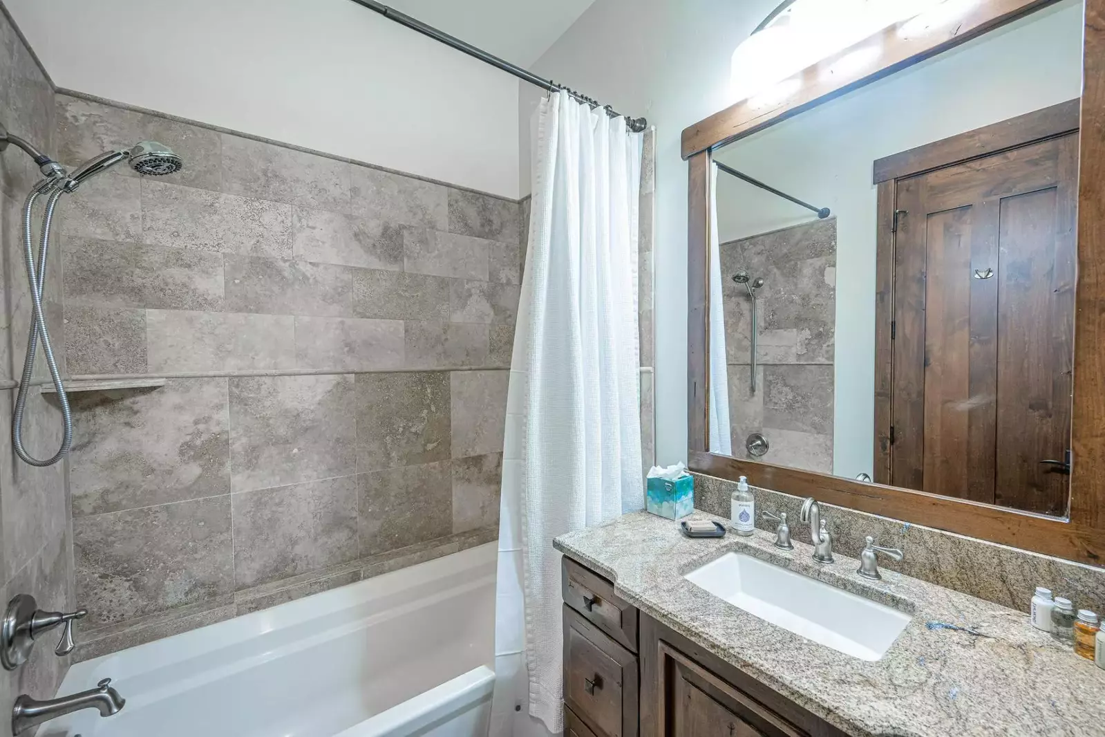 En Suite Bathroom Oversized Soaking Tub and large granite vanity