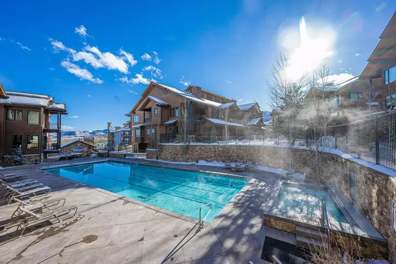 Warm up in this oversized hot tub and pool that are right next to the home.