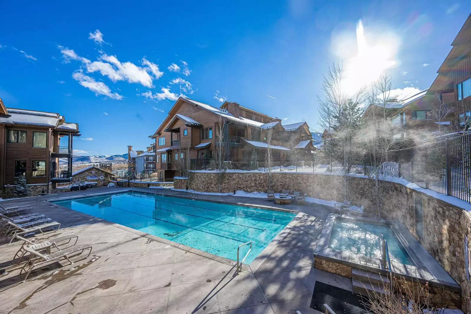 Warm up in this oversized hot tub and pool that are right next to the home.