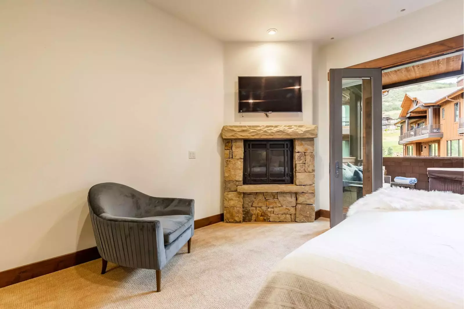 Enjoy the privacy of the primary suite with the private balcony and hot tub.