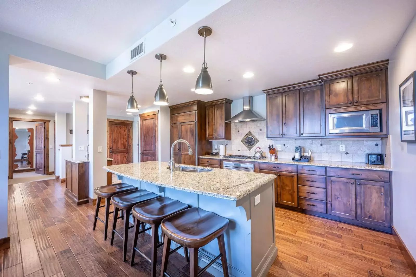 The gourmet kitchen will make any chef at heart happy with the fully stocked home