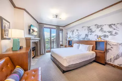 Guest Suite with King Bed, Gas Fireplace, HDTV and Patio Access