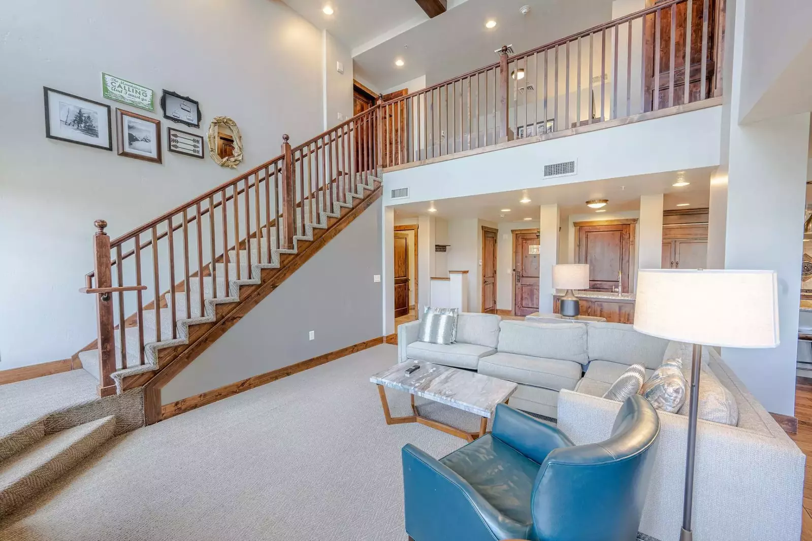 Stairs with solid wooden handles leading to the second floor
