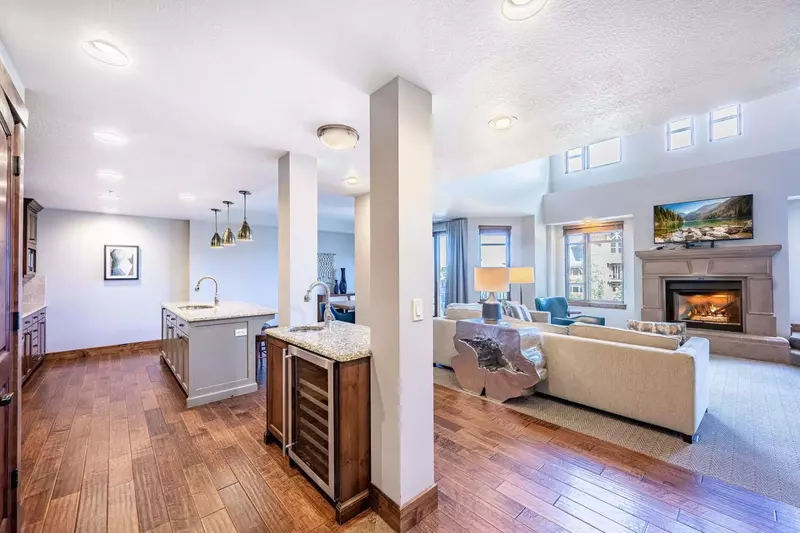 Boasting a spacious open floor plan that flows seamlessly from gourmet kitchen