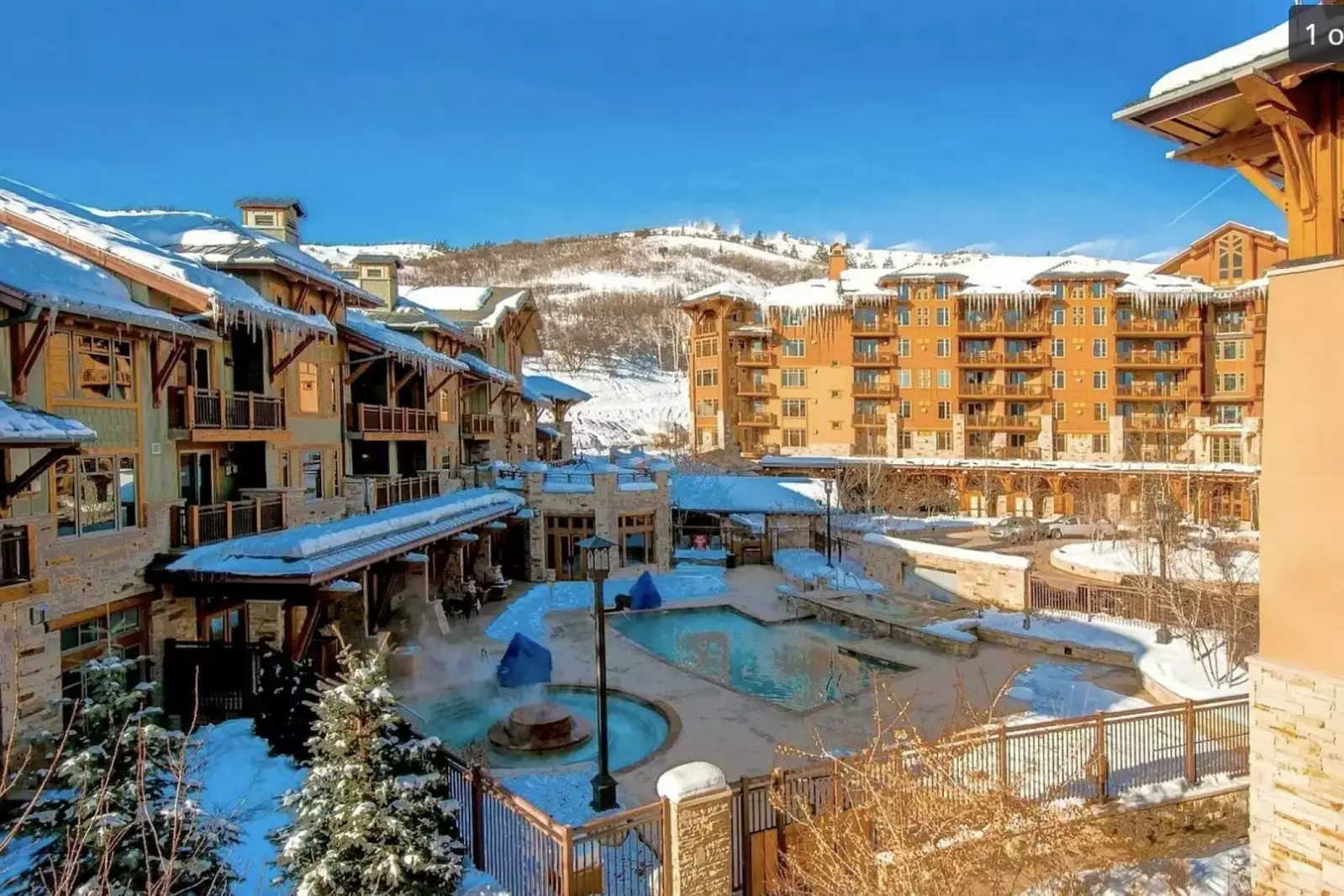 Beautiful views of the hot tub and pools that guests have access to during their stay.