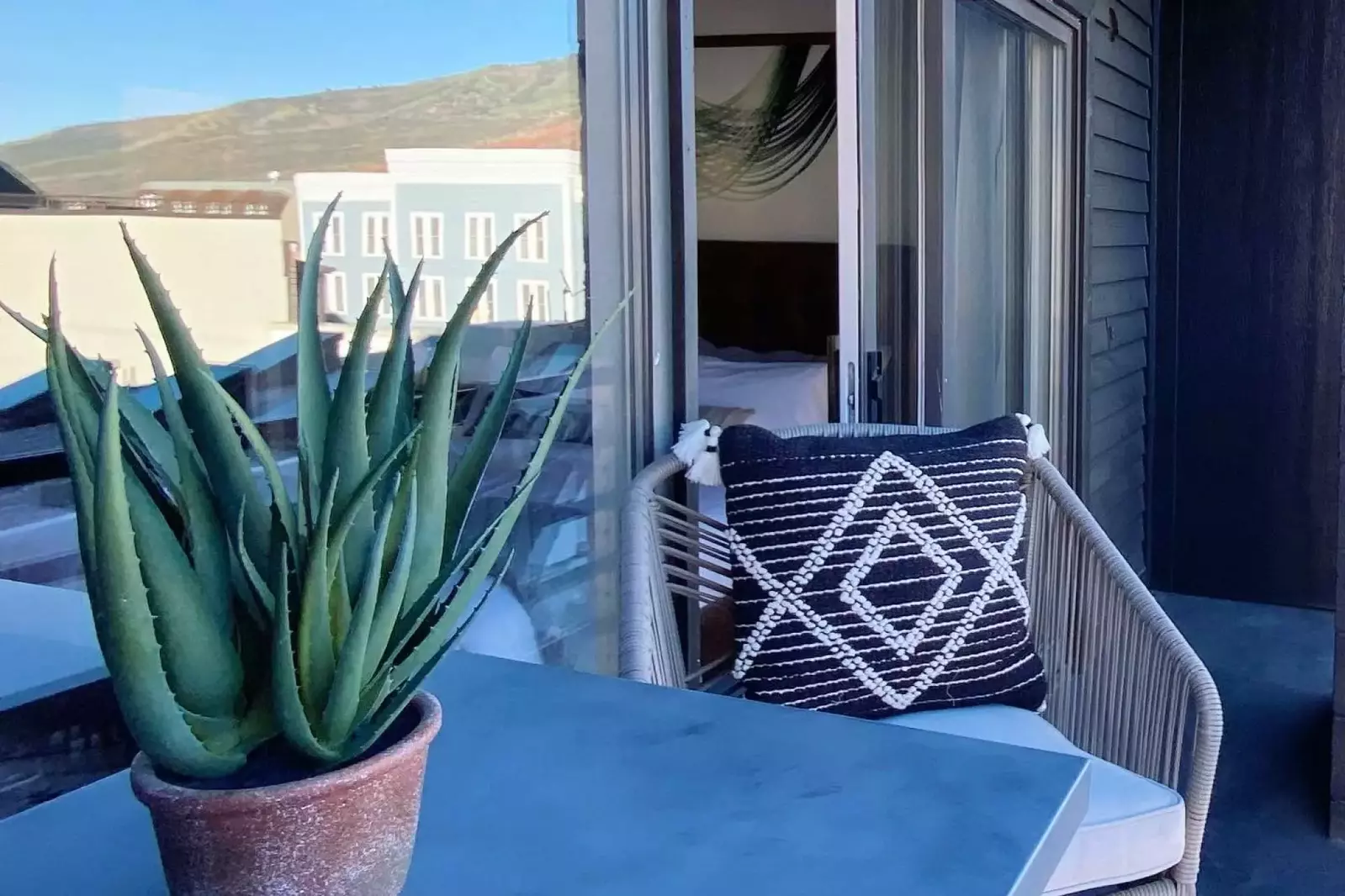 Enjoy a cup of coffee while looking down on Main