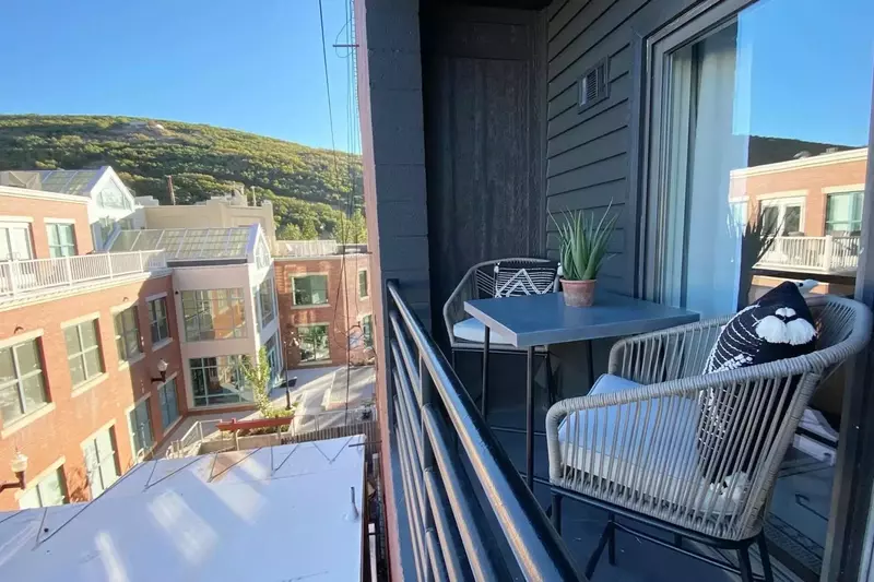 Enjoy a cup of coffee while looking down on Main