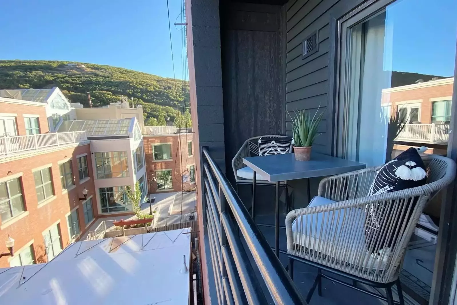 Enjoy a cup of coffee while looking down on Main