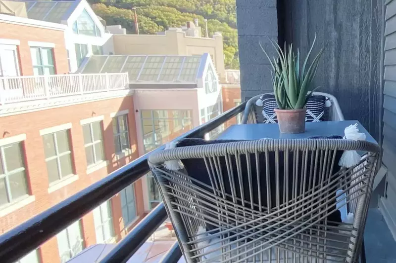 Enjoy a cup of coffee while looking down on Main