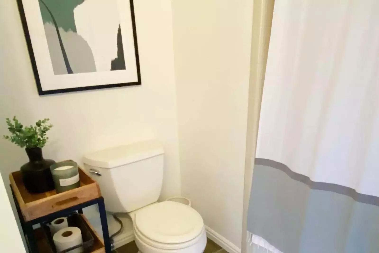 Bathroom has high quality towels, washcloths, hair dyer and starter set of hotel sized toiletries.