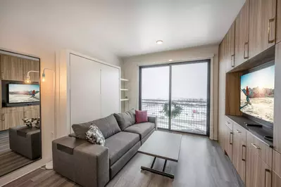 Watch the snow fall from the 8' sliding glass windows and the Juliet balcony while enjoying your favorite Netflix shows on the big screen HDTV