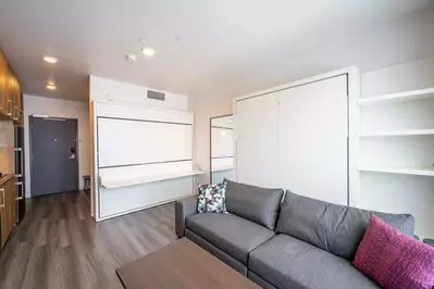 A multi-use shelf (when the twin bunk is away) that you can use as desk space or a table for a quick snack.