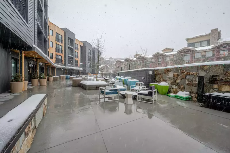 Located on the back side of the resort next to the pool, you will find more cozy places to lounge with views of the slopes and comfortable seating