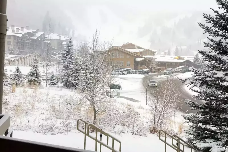 This is the view from the Deck, Walk Down those Stairs to Skiing! Watch the snow fall or skiers come down to the base of Deer Valley resort while rela