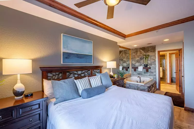 New King Bed by the Bath Tub