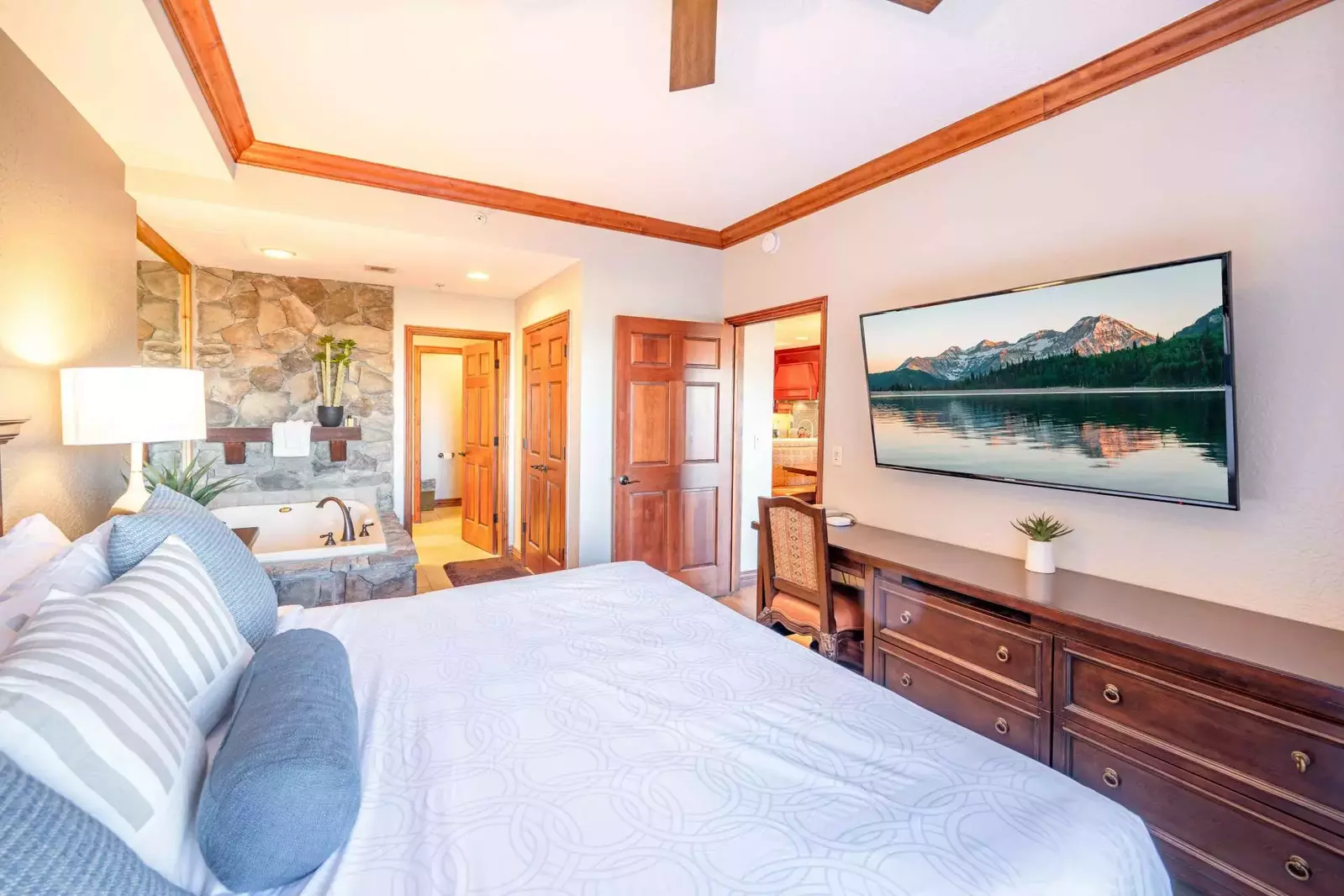 New King Bed on the Primary Suite fronting a New Smart TV