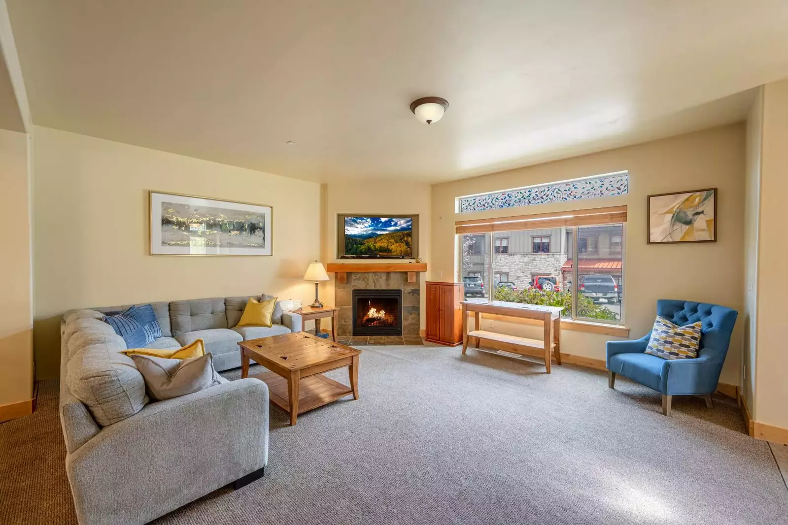 Soft carpeting, plush furniture and a charming gas fireplace will instantly put you at ease.