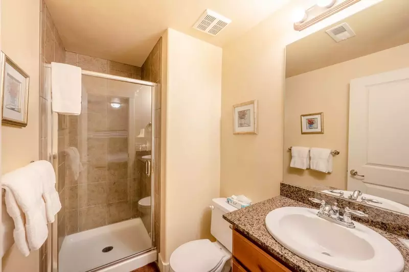 First Bathroom with walk-in glass shower