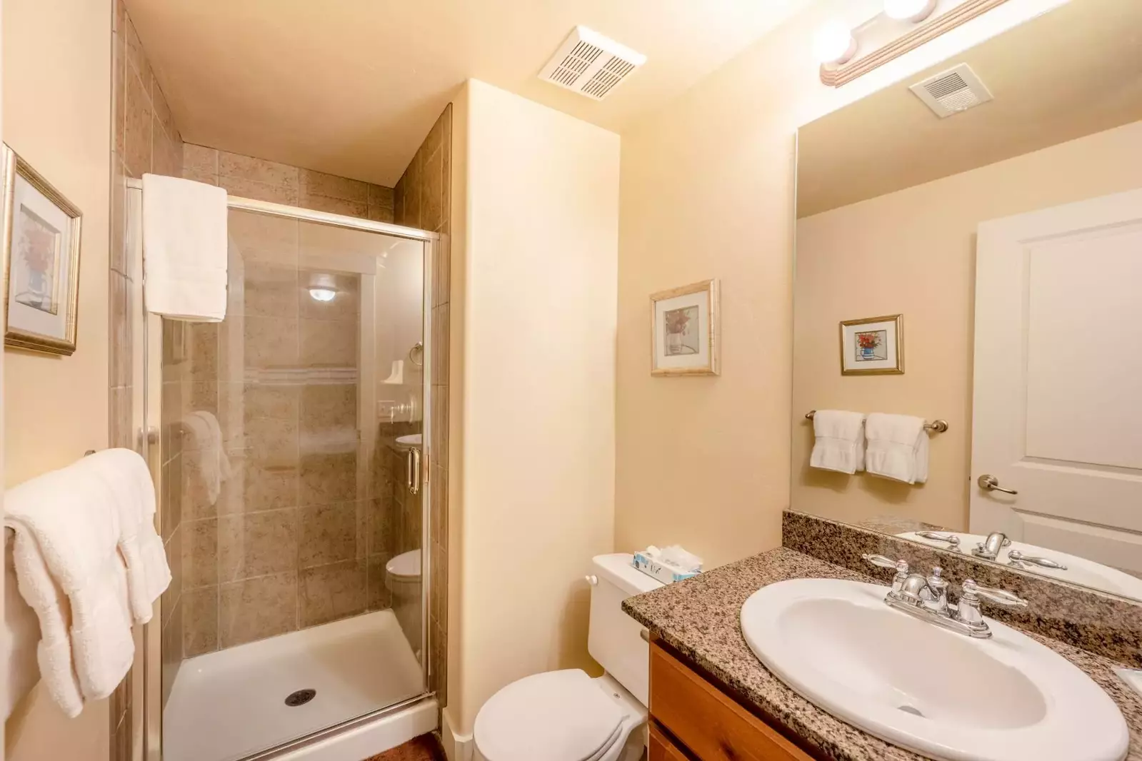 First Bathroom with walk-in glass shower