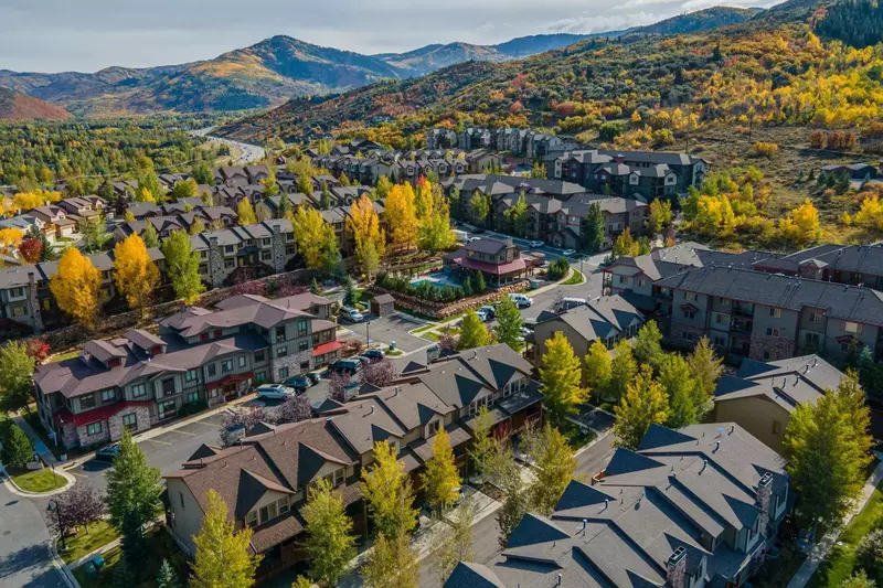 Beyond your own front door, you’ll find community amenities like an outdoor pool and hot tub, a clubhouse, a fitness center