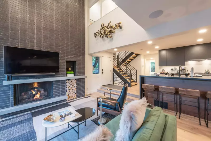 This home is perfect for entertaining with a gorgeous open floor plan that flows seamlessly from one room to the next. Professionally designed and fur