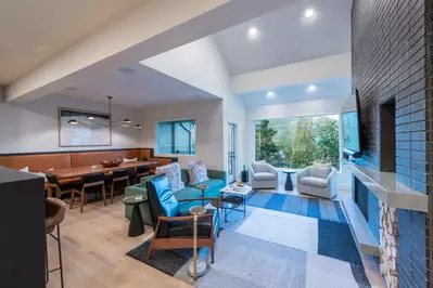 This home is a mid-century modern dream with all new large sun-filled windows